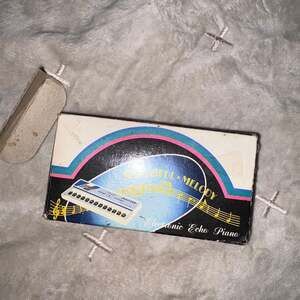 Vintage 1980s Electron Echo Mini Piano Musical Toy with Song Book